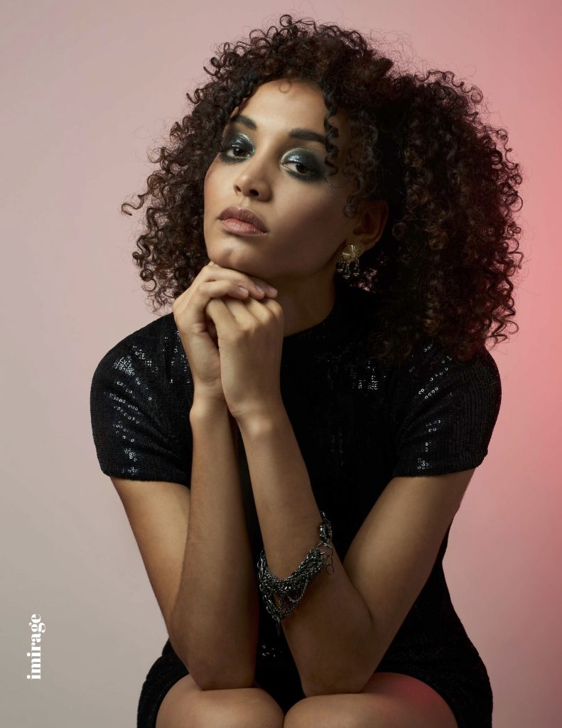 model with gorgeous spiral curls and beautiful professional makeup